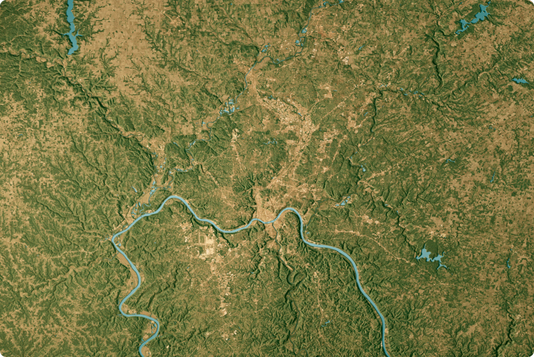 Aerial map showing green terrain and river